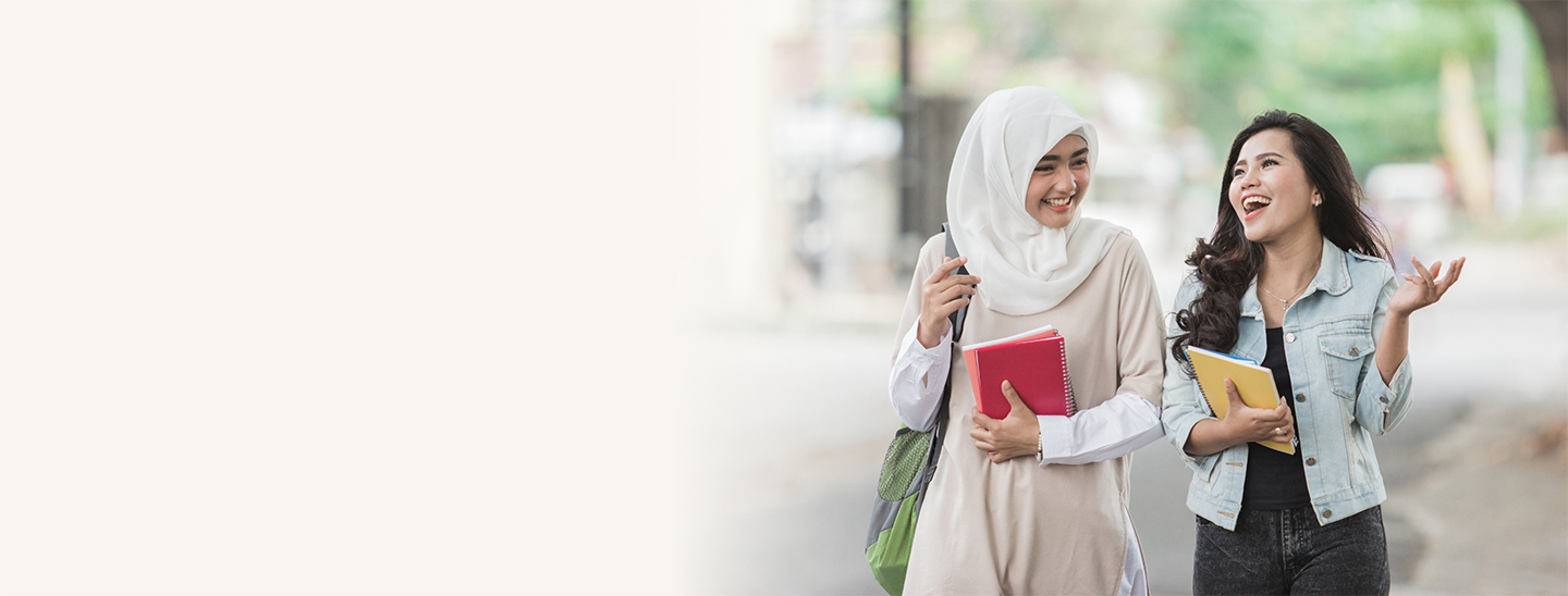 Female students walking together socialising