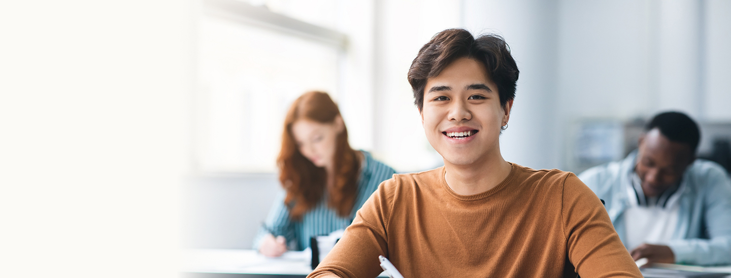 Male Student Sitting in class