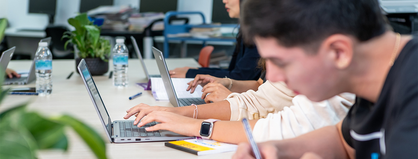 Row of students studying