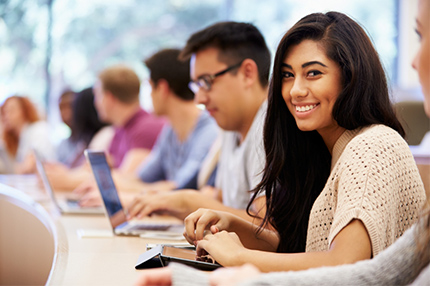 Student in class smiling happy