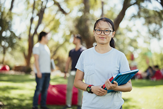 Student outside campus happy