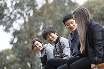 Students outside together Melbourne socialising