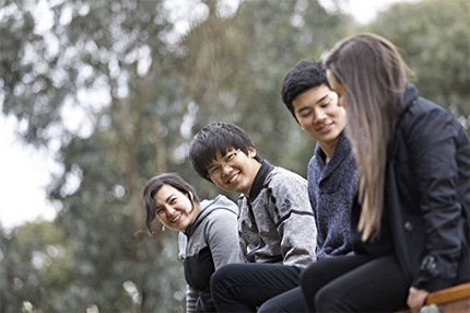 Students outside together Melbourne socialising