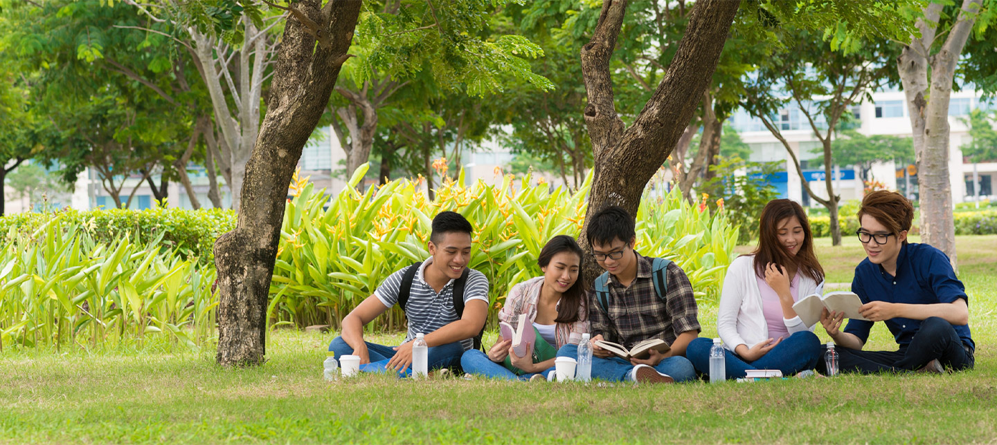 Students sitting outside together