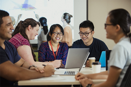 Students together in class studying