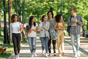 Students walking along path together