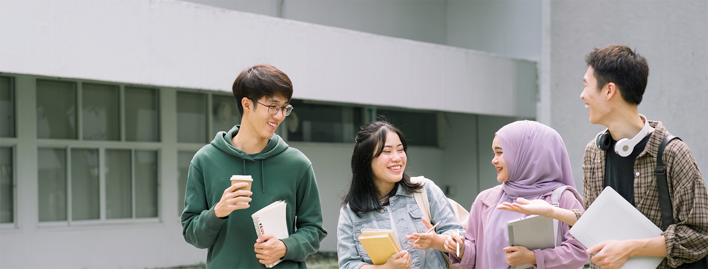 Students walking together outside socialising